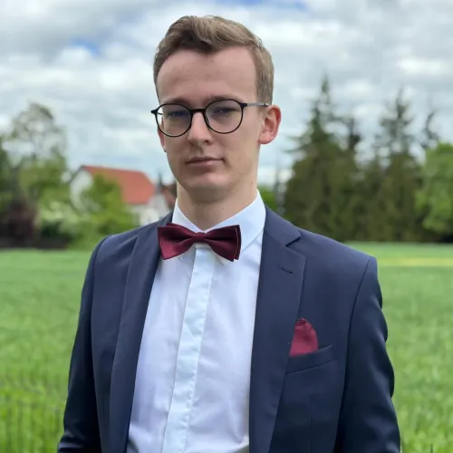 Portrait of Filip Krzyżanowski, a backend developer working with PHP and Laravel